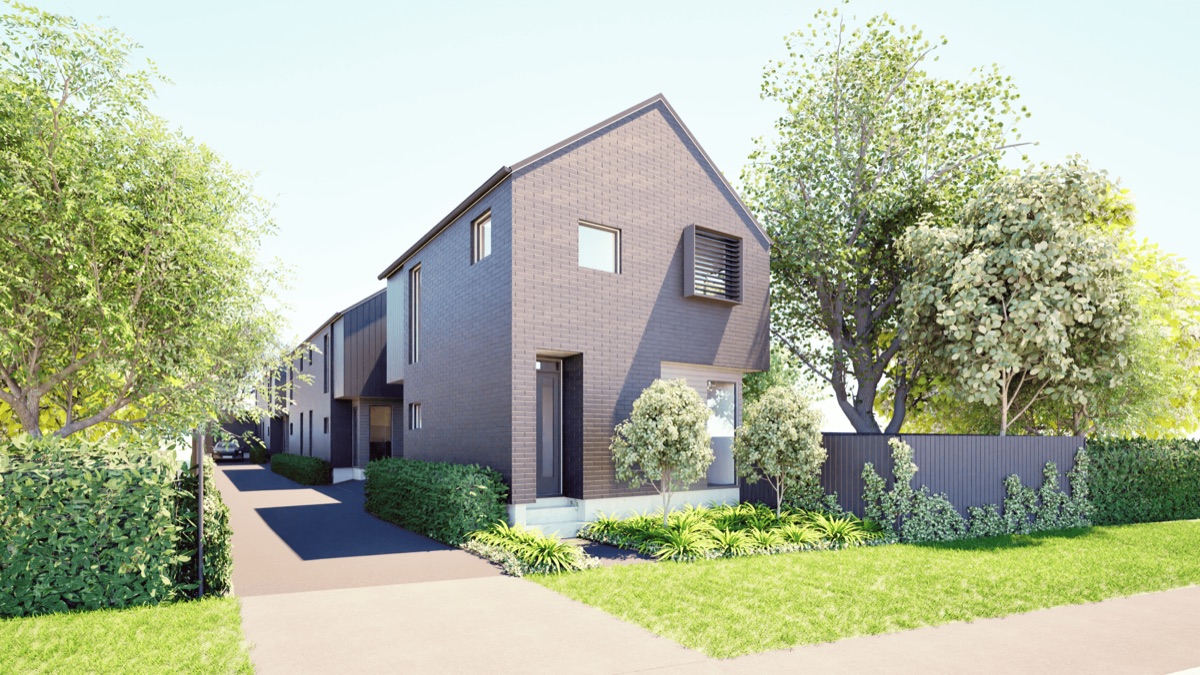 The McLean Townhouses, a row of two-storey brick Fowler Homes townhouses with gabled roofs